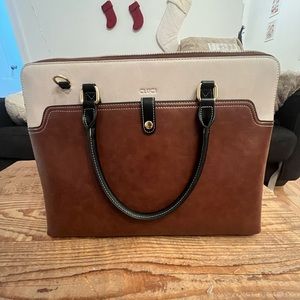 Leather handbag. Great for work. Never been used.